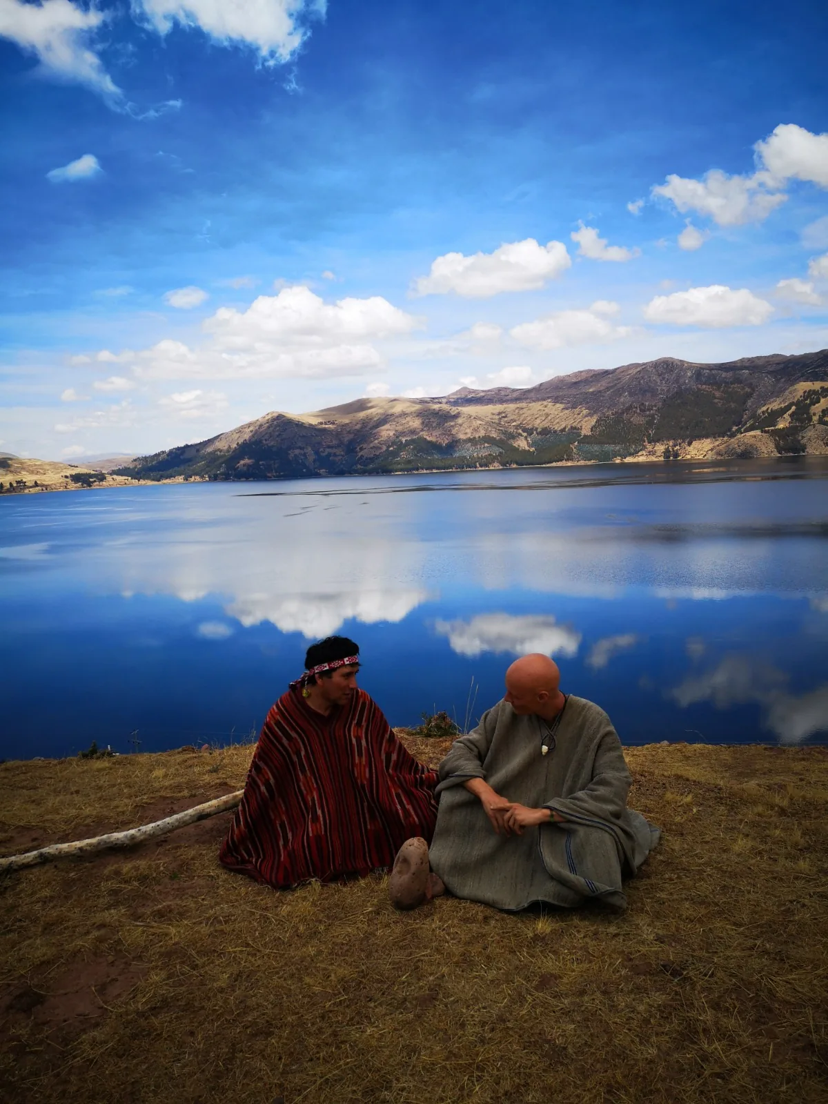 A spiritual conversation beside a lake