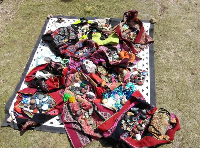 K’uyas and ceremonial objects arranged outdoors